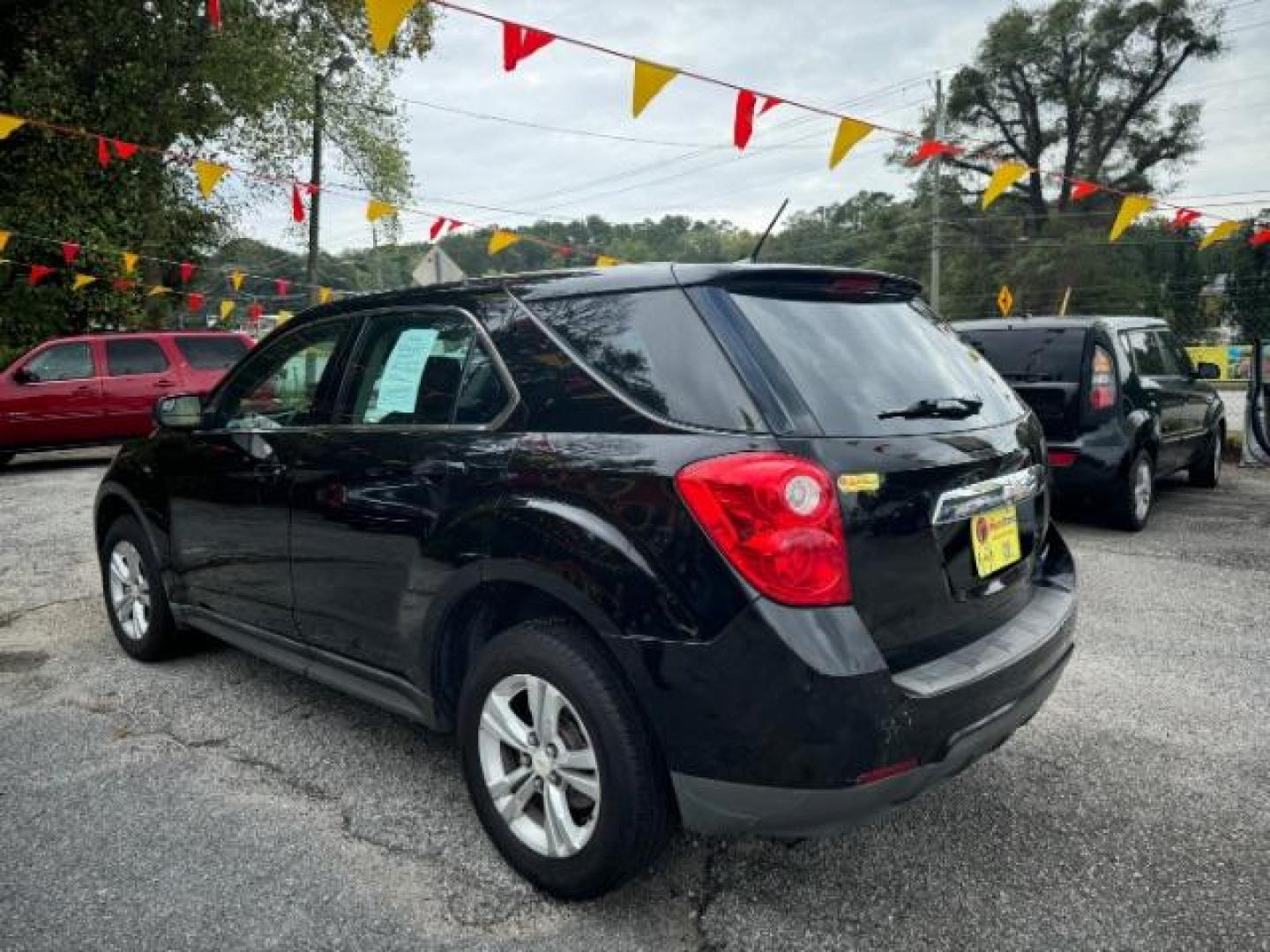 2013 Black Chevrolet Equinox LS 2WD (2GNALBEK6D1) with an 2.4L L4 DOHC 16V engine, 6-Speed Automatic transmission, located at 1806 Veterans Memorial Hwy SW, Austell, GA, 30168, (770) 944-9558, 33.817959, -84.606987 - Photo#3