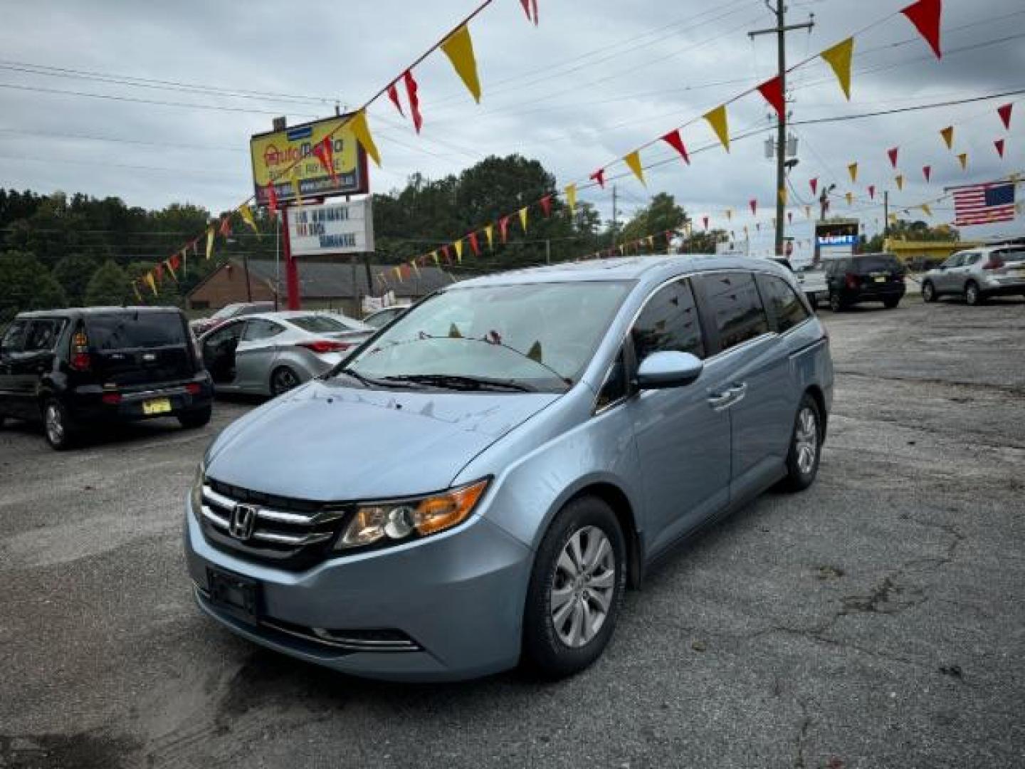 2014 Blue Honda Odyssey EX-L (5FNRL5H61EB) with an 3.5L V6 SOHC 24V engine, 6-Speed Automatic transmission, located at 1806 Veterans Memorial Hwy SW, Austell, GA, 30168, (770) 944-9558, 33.817959, -84.606987 - Photo#0