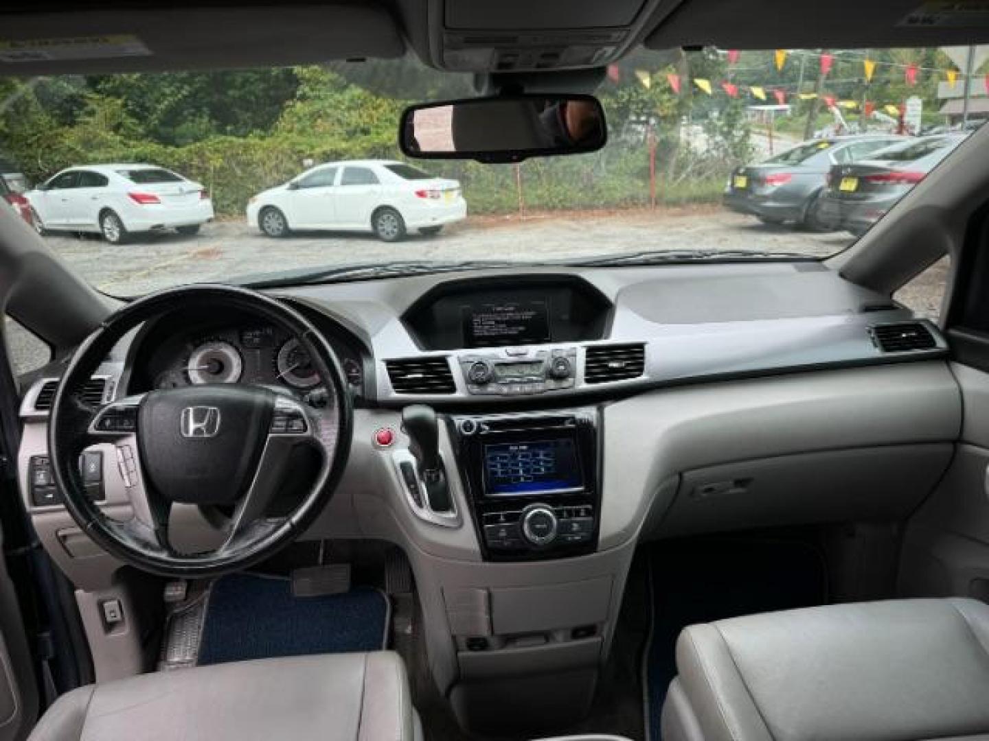 2014 Blue Honda Odyssey EX-L (5FNRL5H61EB) with an 3.5L V6 SOHC 24V engine, 6-Speed Automatic transmission, located at 1806 Veterans Memorial Hwy SW, Austell, GA, 30168, (770) 944-9558, 33.817959, -84.606987 - Photo#10