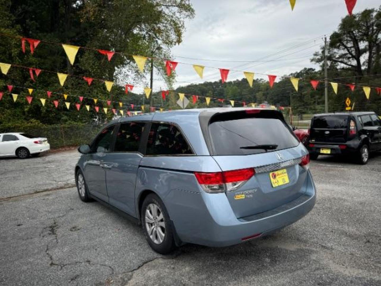 2014 Blue Honda Odyssey EX-L (5FNRL5H61EB) with an 3.5L V6 SOHC 24V engine, 6-Speed Automatic transmission, located at 1806 Veterans Memorial Hwy SW, Austell, GA, 30168, (770) 944-9558, 33.817959, -84.606987 - Photo#5