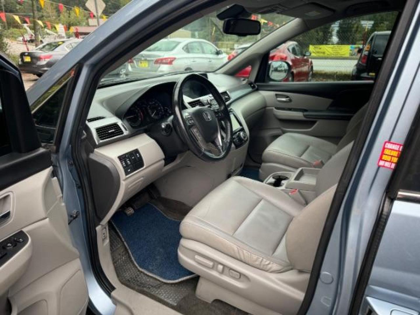 2014 Blue Honda Odyssey EX-L (5FNRL5H61EB) with an 3.5L V6 SOHC 24V engine, 6-Speed Automatic transmission, located at 1806 Veterans Memorial Hwy SW, Austell, GA, 30168, (770) 944-9558, 33.817959, -84.606987 - Photo#6