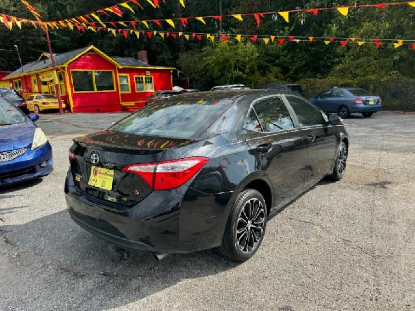 2014 Black Toyota Corolla S CVT (5YFBURHE2EP) with an 1.8L L4 DOHC 16V engine, Continuously Variable Transmission transmission, located at 1806 Veterans Memorial Hwy SW, Austell, GA, 30168, (770) 944-9558, 33.817959, -84.606987 - Photo#2