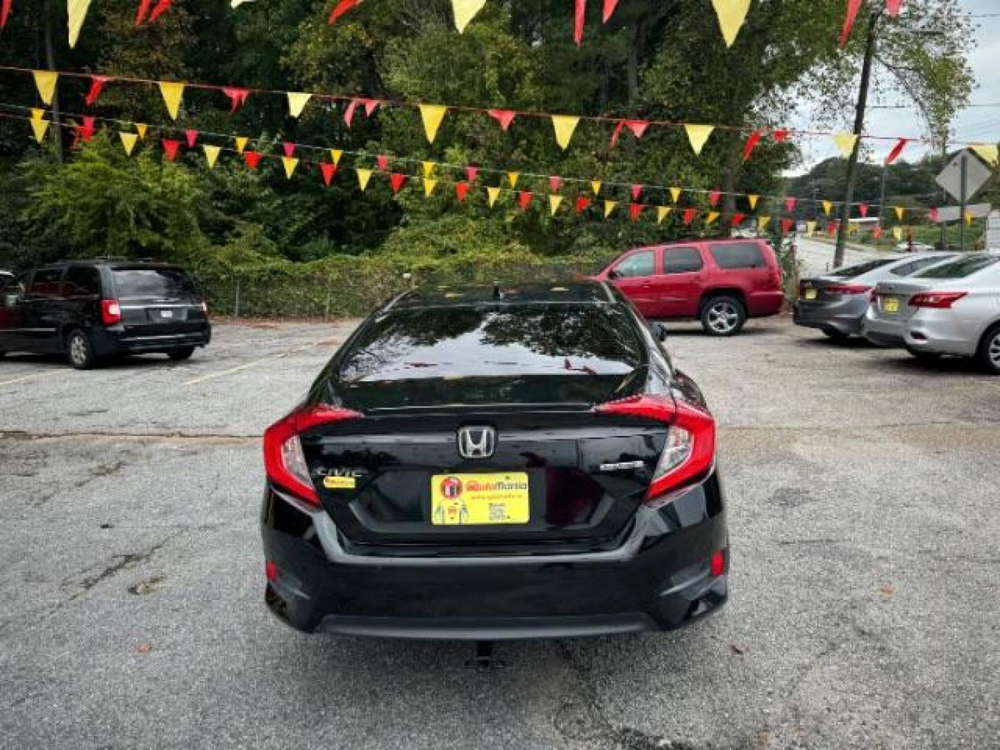 2016 Black Honda Civic Touring Sedan CVT (19XFC1F94GE) with an 1.5L L4 DOHC 16V TURBO engine, Continuously Variable Transmission transmission, located at 1806 Veterans Memorial Hwy SW, Austell, GA, 30168, (770) 944-9558, 33.817959, -84.606987 - Photo#11