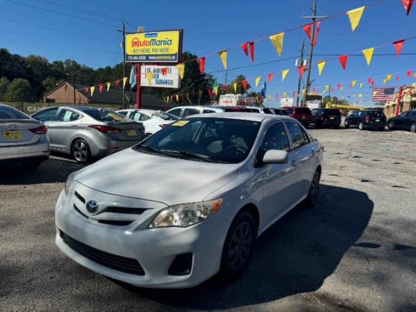 2013 White Toyota Corolla LE 4-Speed AT (JTDBU4EE4DJ) with an 1.8L L4 DOHC 16V engine, 4-Speed Automatic transmission, located at 1806 Veterans Memorial Hwy SW, Austell, GA, 30168, (770) 944-9558, 33.817959, -84.606987 - Photo#0