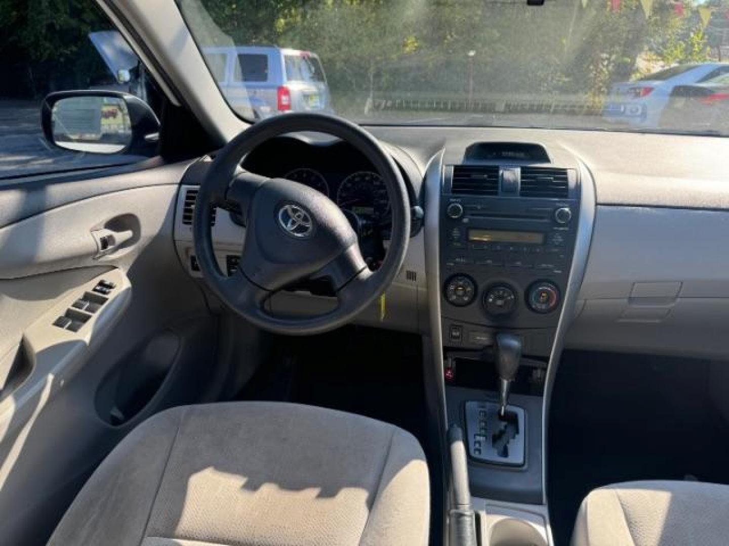 2013 White Toyota Corolla LE 4-Speed AT (JTDBU4EE4DJ) with an 1.8L L4 DOHC 16V engine, 4-Speed Automatic transmission, located at 1806 Veterans Memorial Hwy SW, Austell, GA, 30168, (770) 944-9558, 33.817959, -84.606987 - Photo#11