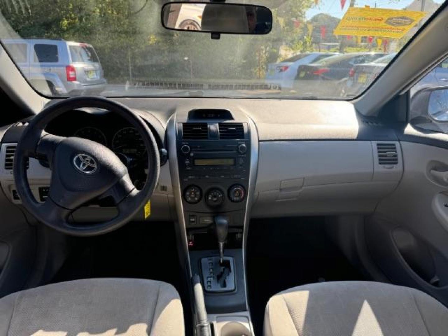 2013 White Toyota Corolla LE 4-Speed AT (JTDBU4EE4DJ) with an 1.8L L4 DOHC 16V engine, 4-Speed Automatic transmission, located at 1806 Veterans Memorial Hwy SW, Austell, GA, 30168, (770) 944-9558, 33.817959, -84.606987 - Photo#12