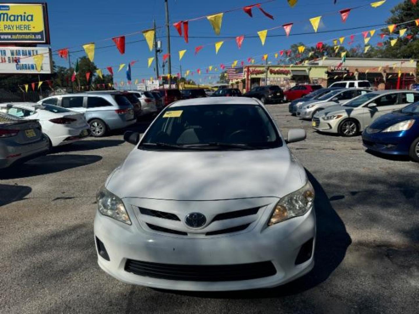 2013 White Toyota Corolla LE 4-Speed AT (JTDBU4EE4DJ) with an 1.8L L4 DOHC 16V engine, 4-Speed Automatic transmission, located at 1806 Veterans Memorial Hwy SW, Austell, GA, 30168, (770) 944-9558, 33.817959, -84.606987 - Photo#1