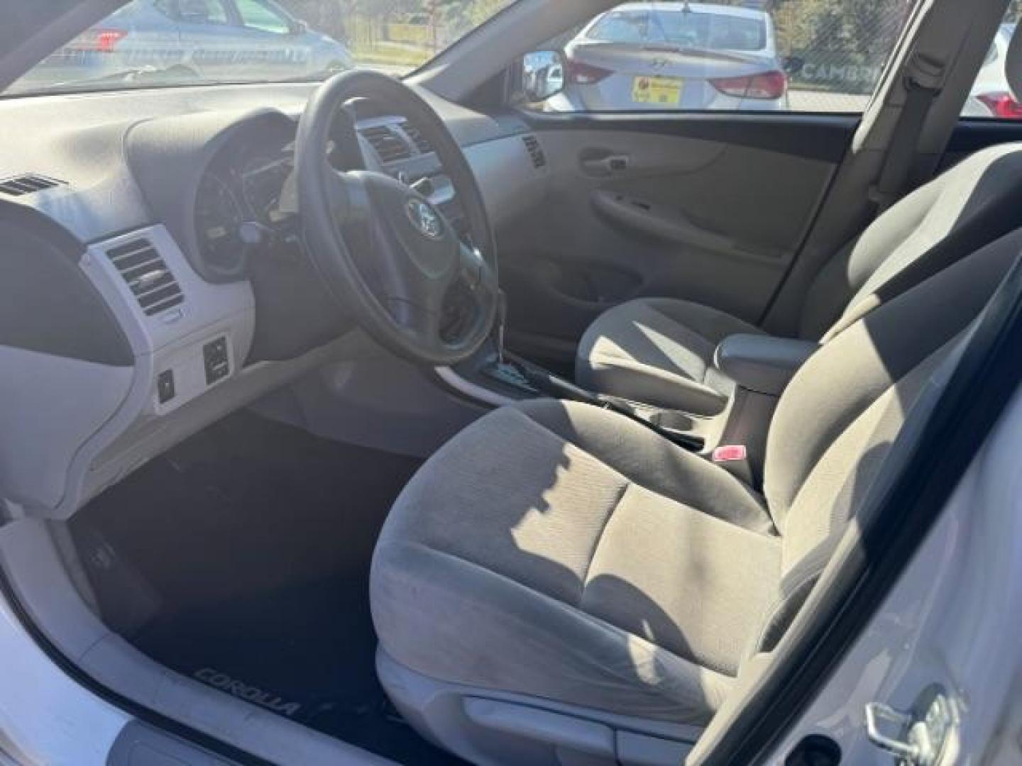 2013 White Toyota Corolla LE 4-Speed AT (JTDBU4EE4DJ) with an 1.8L L4 DOHC 16V engine, 4-Speed Automatic transmission, located at 1806 Veterans Memorial Hwy SW, Austell, GA, 30168, (770) 944-9558, 33.817959, -84.606987 - Photo#6