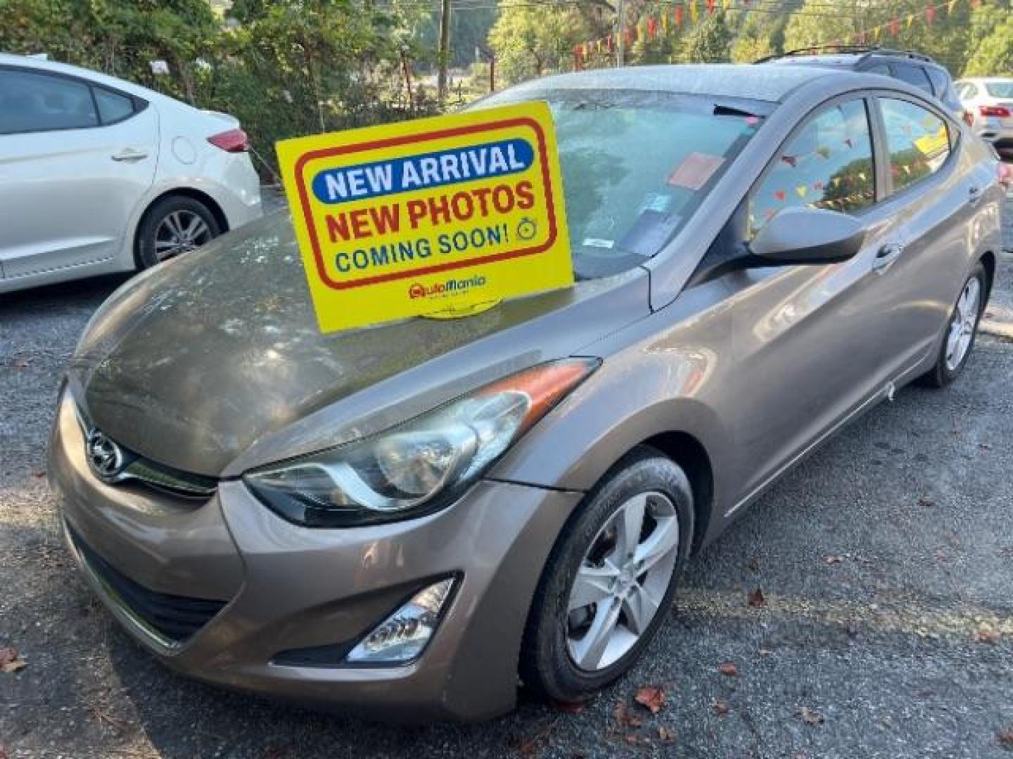 2013 Brown Hyundai Elantra GLS A/T (5NPDH4AE0DH) with an 1.8L L4 DOHC 16V engine, 6-Speed Automatic transmission, located at 1806 Veterans Memorial Hwy SW, Austell, GA, 30168, (770) 944-9558, 33.817959, -84.606987 - Photo#0