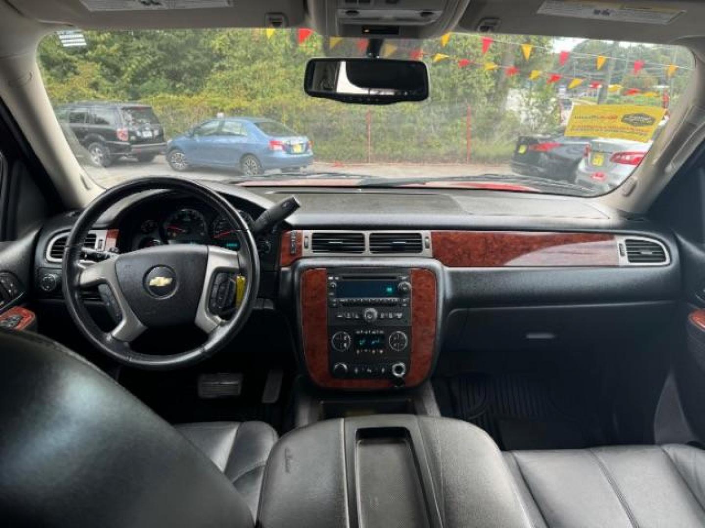 2014 Red Chevrolet Tahoe LT 2WD (1GNSCBE03ER) with an 5.3L V8 OHV 16V FFV engine, 6-Speed Automatic transmission, located at 1806 Veterans Memorial Hwy SW, Austell, GA, 30168, (770) 944-9558, 33.817959, -84.606987 - Photo#11