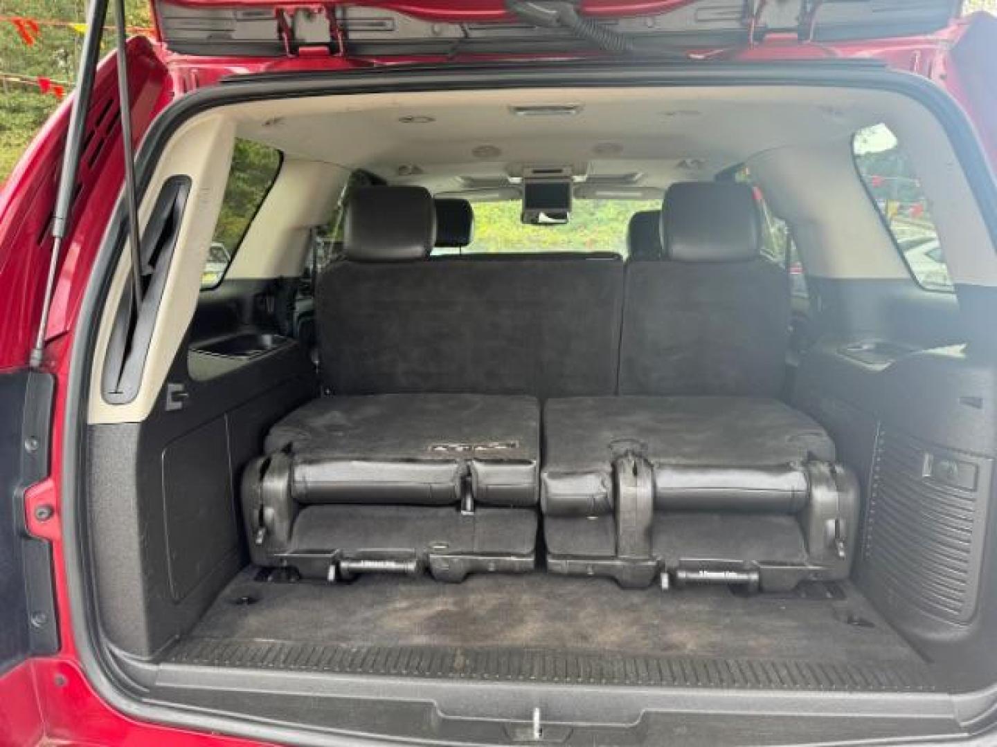 2014 Red Chevrolet Tahoe LT 2WD (1GNSCBE03ER) with an 5.3L V8 OHV 16V FFV engine, 6-Speed Automatic transmission, located at 1806 Veterans Memorial Hwy SW, Austell, GA, 30168, (770) 944-9558, 33.817959, -84.606987 - Photo#16