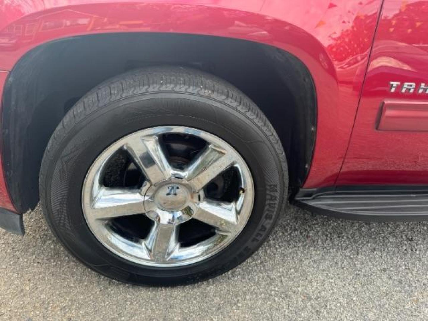 2014 Red Chevrolet Tahoe LT 2WD (1GNSCBE03ER) with an 5.3L V8 OHV 16V FFV engine, 6-Speed Automatic transmission, located at 1806 Veterans Memorial Hwy SW, Austell, GA, 30168, (770) 944-9558, 33.817959, -84.606987 - Photo#23