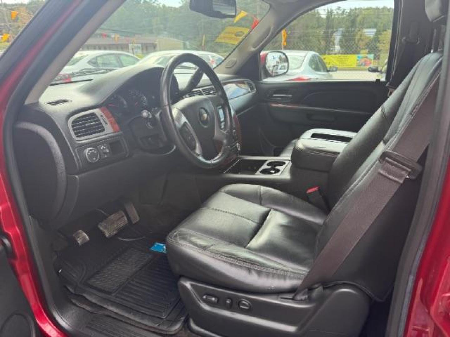 2014 Red Chevrolet Tahoe LT 2WD (1GNSCBE03ER) with an 5.3L V8 OHV 16V FFV engine, 6-Speed Automatic transmission, located at 1806 Veterans Memorial Hwy SW, Austell, GA, 30168, (770) 944-9558, 33.817959, -84.606987 - Photo#6