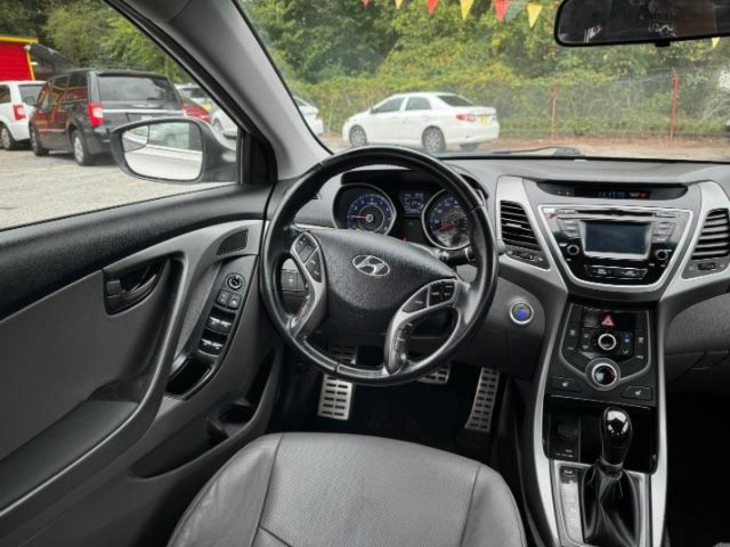 2014 Silver Hyundai Elantra GLS A/T (KMHDH4AHXEU) with an 2.0L L4 DOHC 16V engine, 6-Speed Automatic transmission, located at 1806 Veterans Memorial Hwy SW, Austell, GA, 30168, (770) 944-9558, 33.817959, -84.606987 - Photo#12