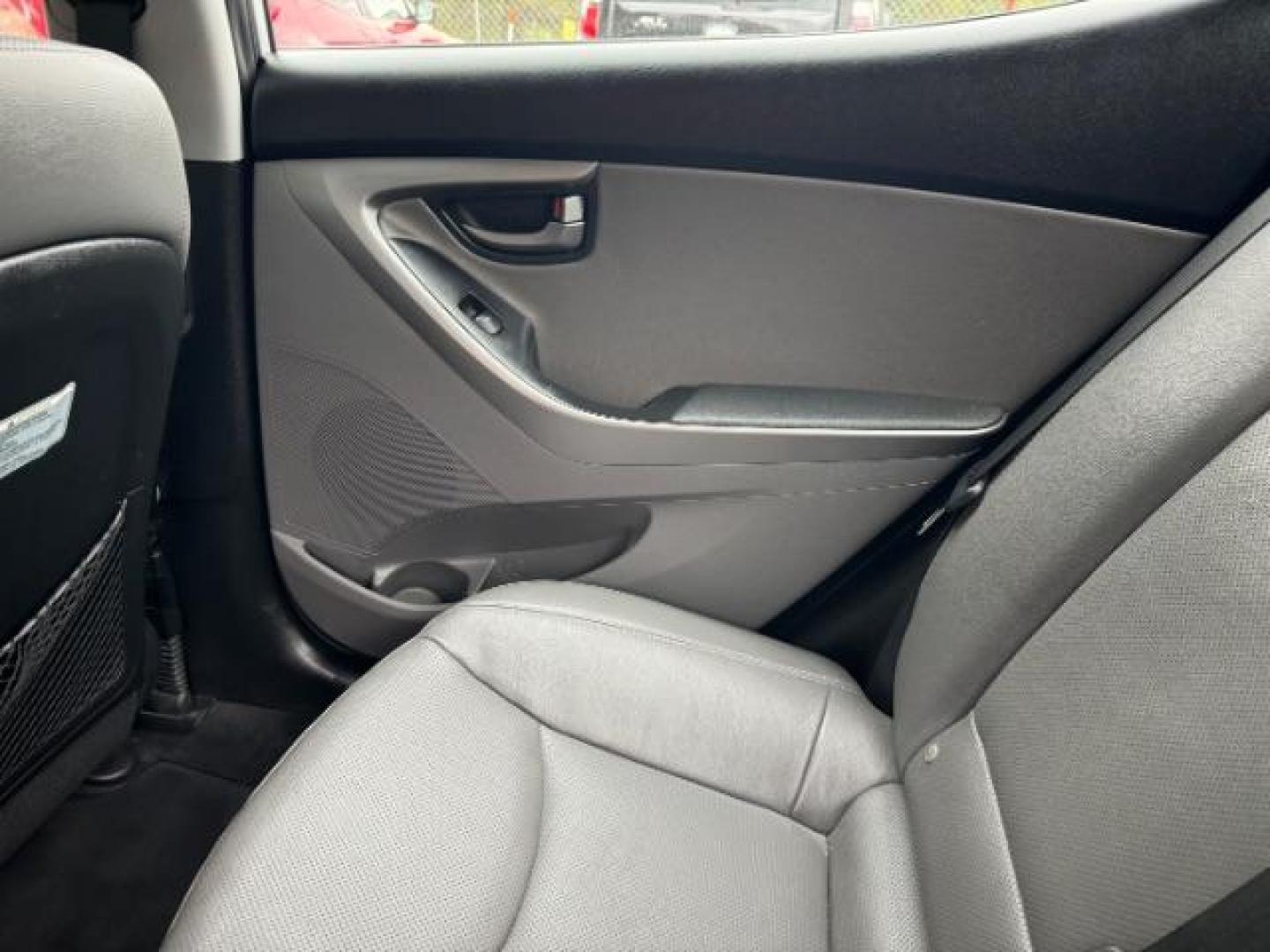 2014 Silver Hyundai Elantra GLS A/T (KMHDH4AHXEU) with an 2.0L L4 DOHC 16V engine, 6-Speed Automatic transmission, located at 1806 Veterans Memorial Hwy SW, Austell, GA, 30168, (770) 944-9558, 33.817959, -84.606987 - Photo#14