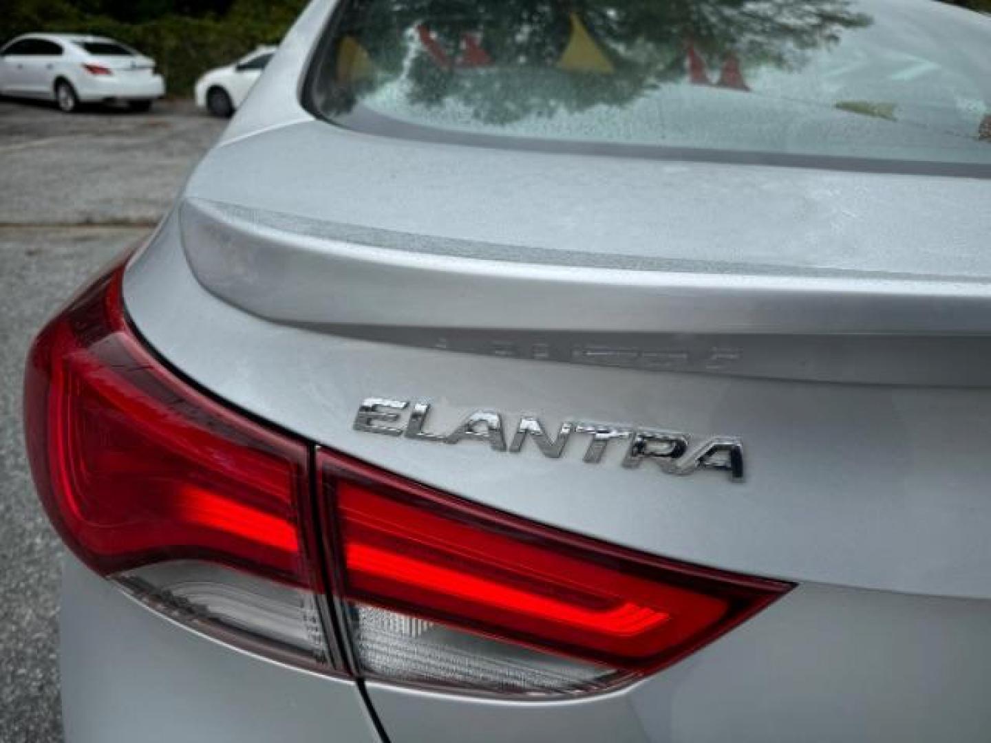 2014 Silver Hyundai Elantra GLS A/T (KMHDH4AHXEU) with an 2.0L L4 DOHC 16V engine, 6-Speed Automatic transmission, located at 1806 Veterans Memorial Hwy SW, Austell, GA, 30168, (770) 944-9558, 33.817959, -84.606987 - Photo#16