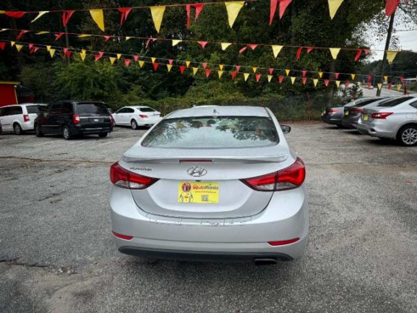 2014 Silver Hyundai Elantra GLS A/T (KMHDH4AHXEU) with an 2.0L L4 DOHC 16V engine, 6-Speed Automatic transmission, located at 1806 Veterans Memorial Hwy SW, Austell, GA, 30168, (770) 944-9558, 33.817959, -84.606987 - Photo#3