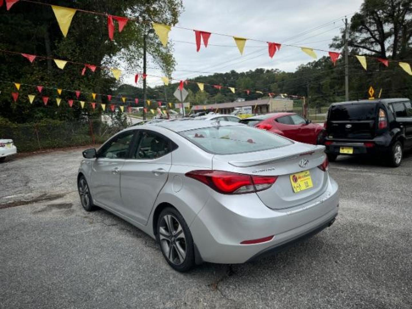 2014 Silver Hyundai Elantra GLS A/T (KMHDH4AHXEU) with an 2.0L L4 DOHC 16V engine, 6-Speed Automatic transmission, located at 1806 Veterans Memorial Hwy SW, Austell, GA, 30168, (770) 944-9558, 33.817959, -84.606987 - Photo#4