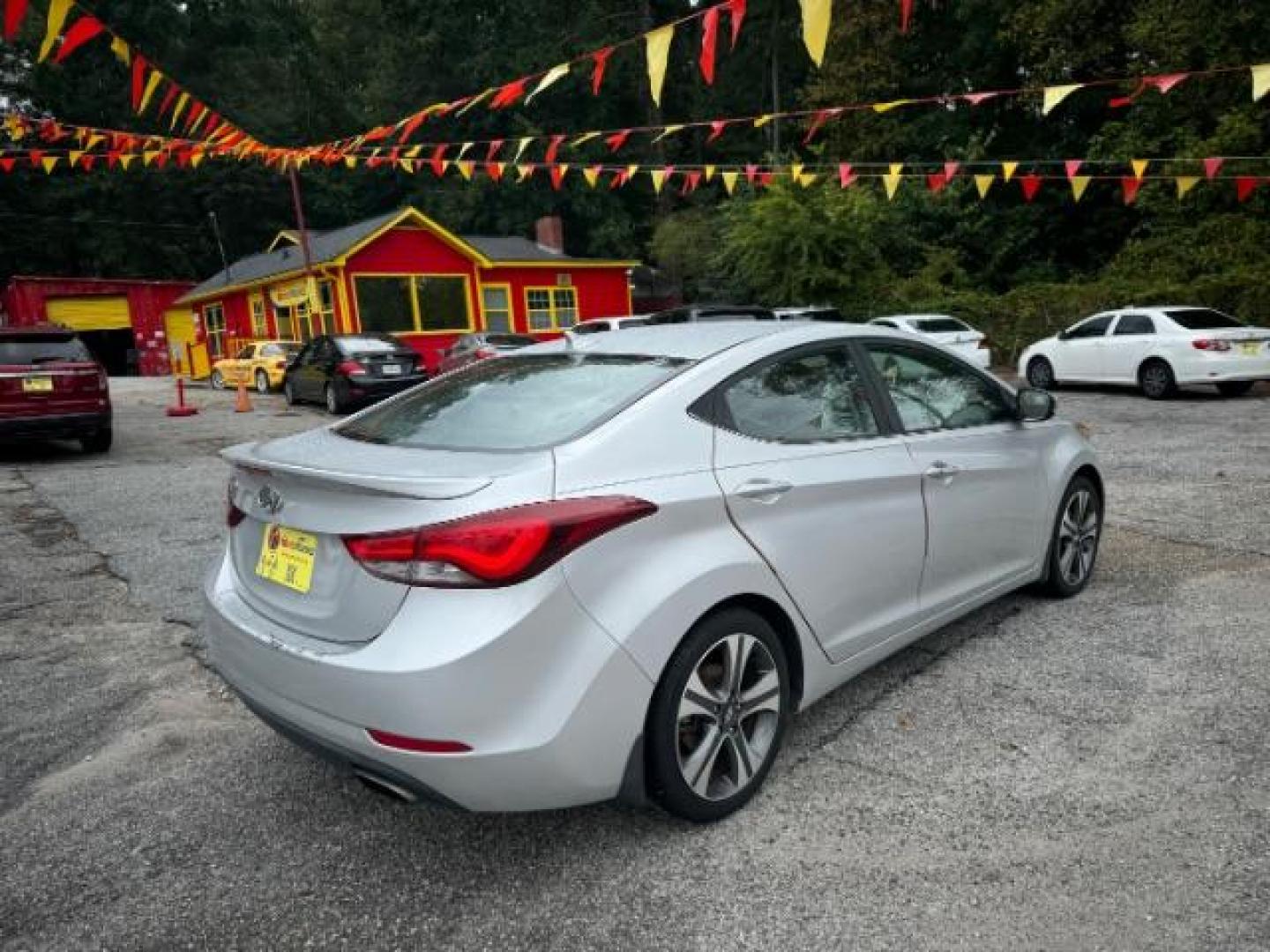 2014 Silver Hyundai Elantra GLS A/T (KMHDH4AHXEU) with an 2.0L L4 DOHC 16V engine, 6-Speed Automatic transmission, located at 1806 Veterans Memorial Hwy SW, Austell, GA, 30168, (770) 944-9558, 33.817959, -84.606987 - Photo#5