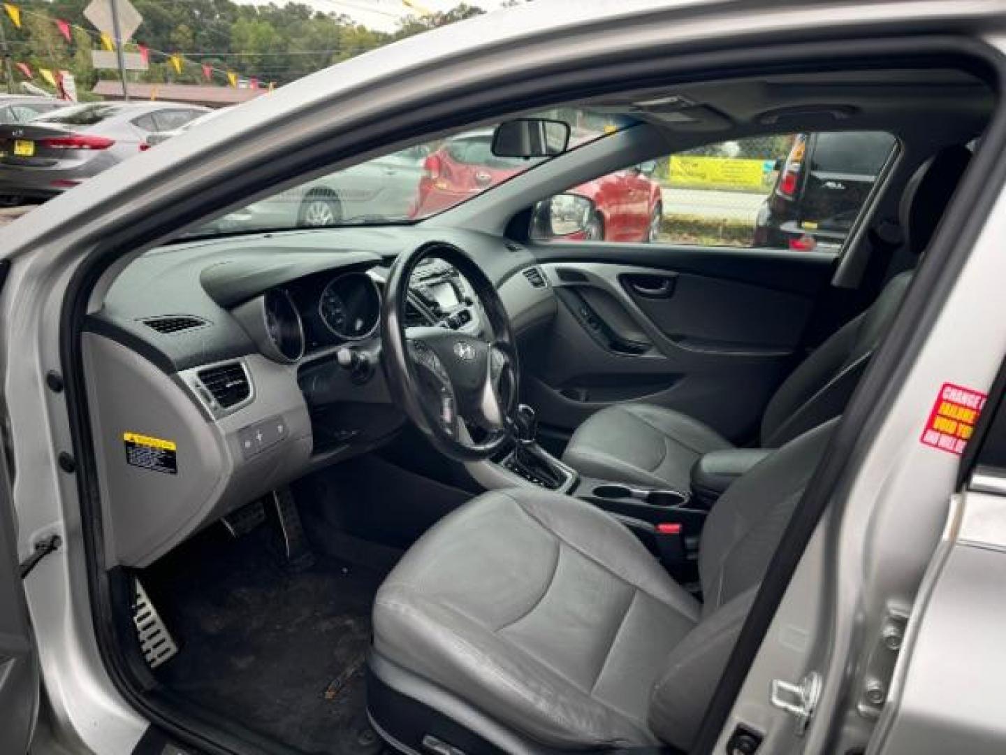 2014 Silver Hyundai Elantra GLS A/T (KMHDH4AHXEU) with an 2.0L L4 DOHC 16V engine, 6-Speed Automatic transmission, located at 1806 Veterans Memorial Hwy SW, Austell, GA, 30168, (770) 944-9558, 33.817959, -84.606987 - Photo#6