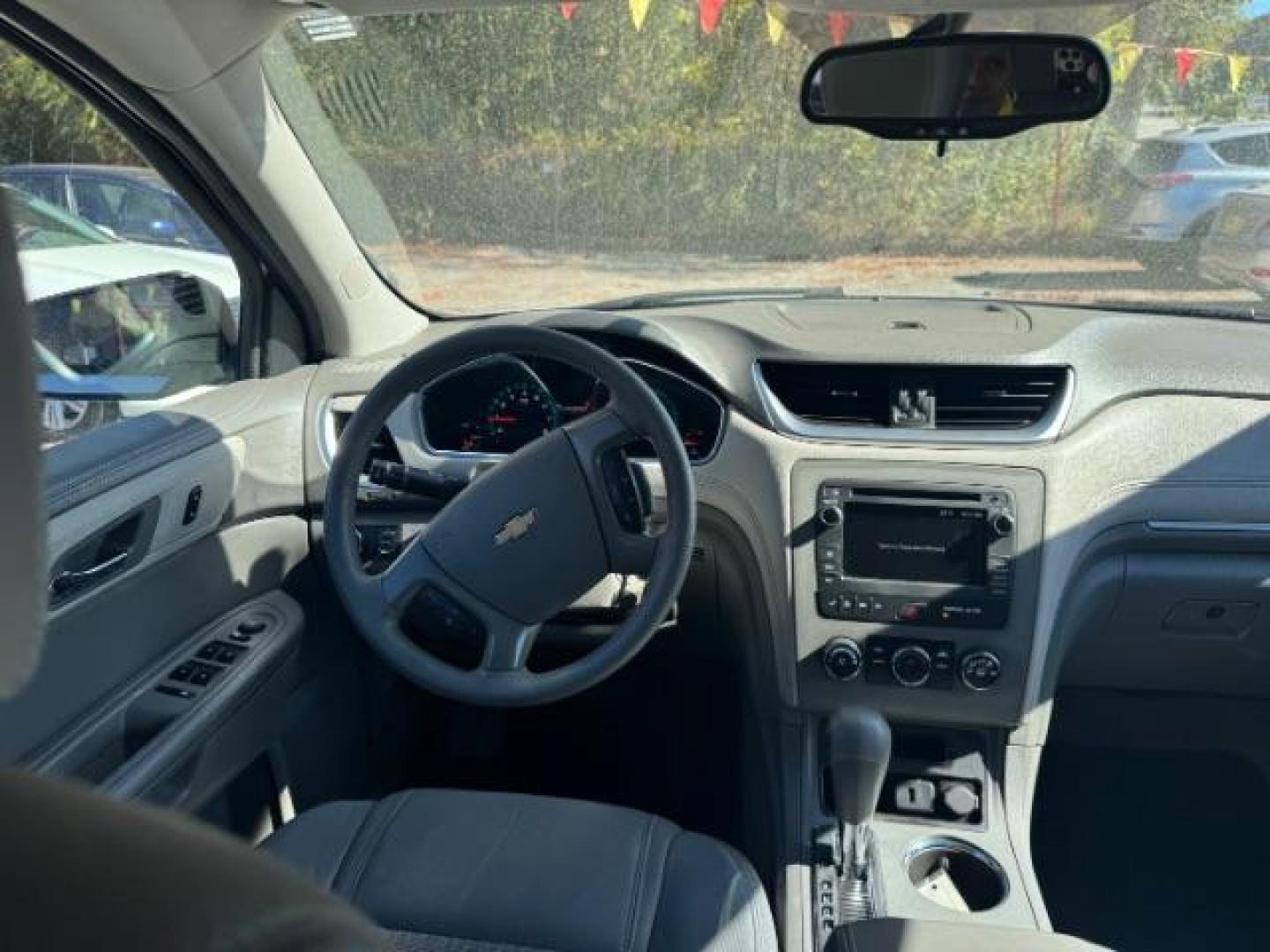 2016 Silver Chevrolet Traverse LS FWD w/PDC (1GNKRFED9GJ) with an 3.6L V6 DOHC 24V engine, 6-Speed Automatic transmission, located at 1806 Veterans Memorial Hwy SW, Austell, GA, 30168, (770) 944-9558, 33.817959, -84.606987 - Photo#12