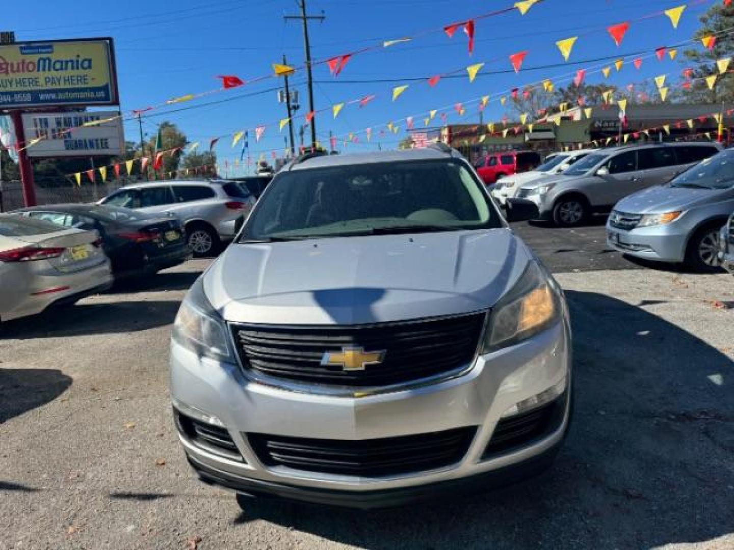 2016 Silver Chevrolet Traverse LS FWD w/PDC (1GNKRFED9GJ) with an 3.6L V6 DOHC 24V engine, 6-Speed Automatic transmission, located at 1806 Veterans Memorial Hwy SW, Austell, GA, 30168, (770) 944-9558, 33.817959, -84.606987 - Photo#0