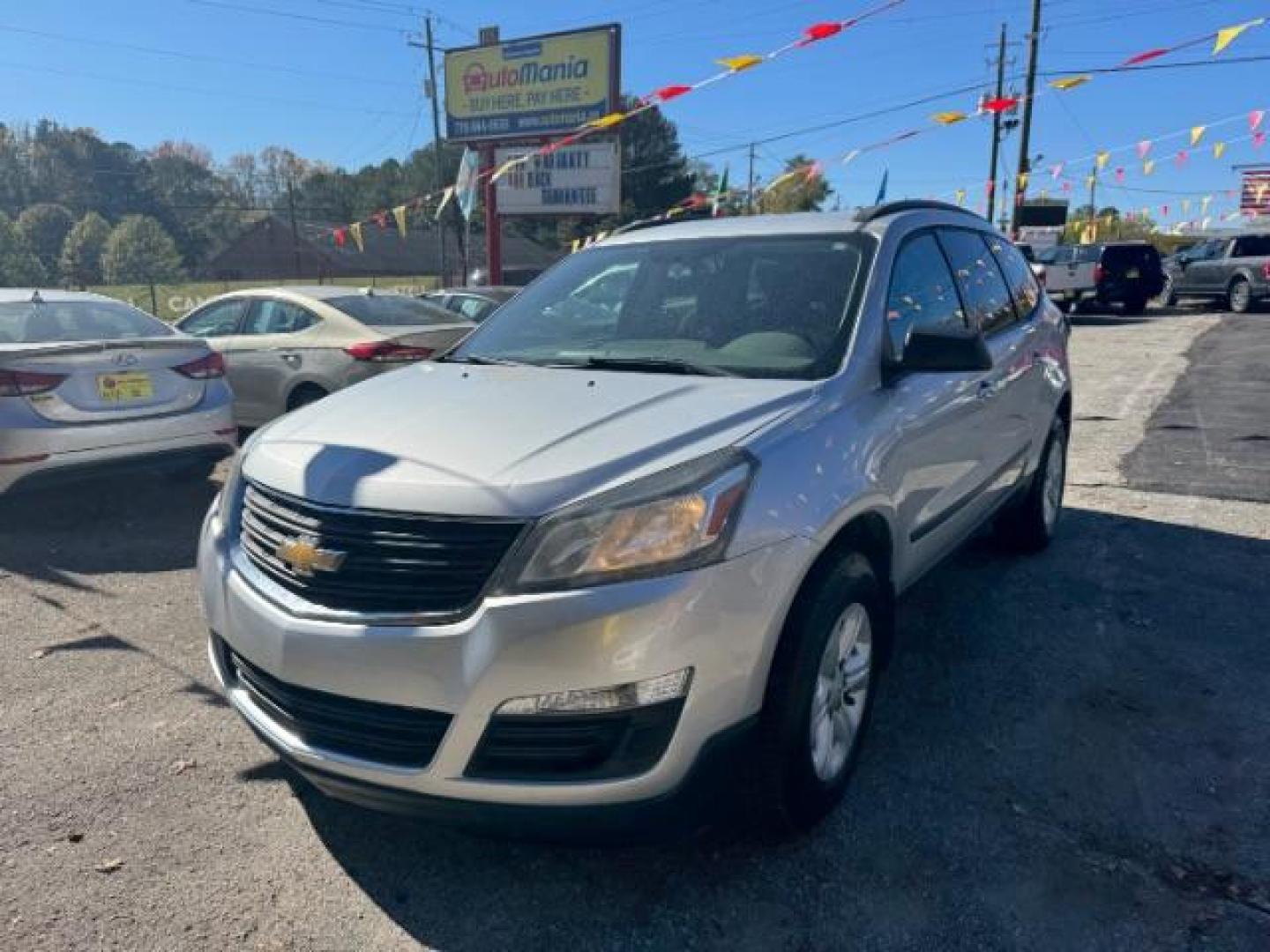 2016 Silver Chevrolet Traverse LS FWD w/PDC (1GNKRFED9GJ) with an 3.6L V6 DOHC 24V engine, 6-Speed Automatic transmission, located at 1806 Veterans Memorial Hwy SW, Austell, GA, 30168, (770) 944-9558, 33.817959, -84.606987 - Photo#1