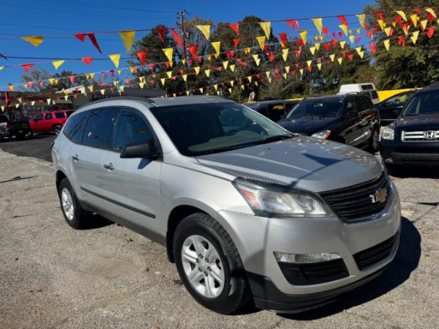 2016 Silver Chevrolet Traverse LS FWD w/PDC (1GNKRFED9GJ) with an 3.6L V6 DOHC 24V engine, 6-Speed Automatic transmission, located at 1806 Veterans Memorial Hwy SW, Austell, GA, 30168, (770) 944-9558, 33.817959, -84.606987 - Photo#3