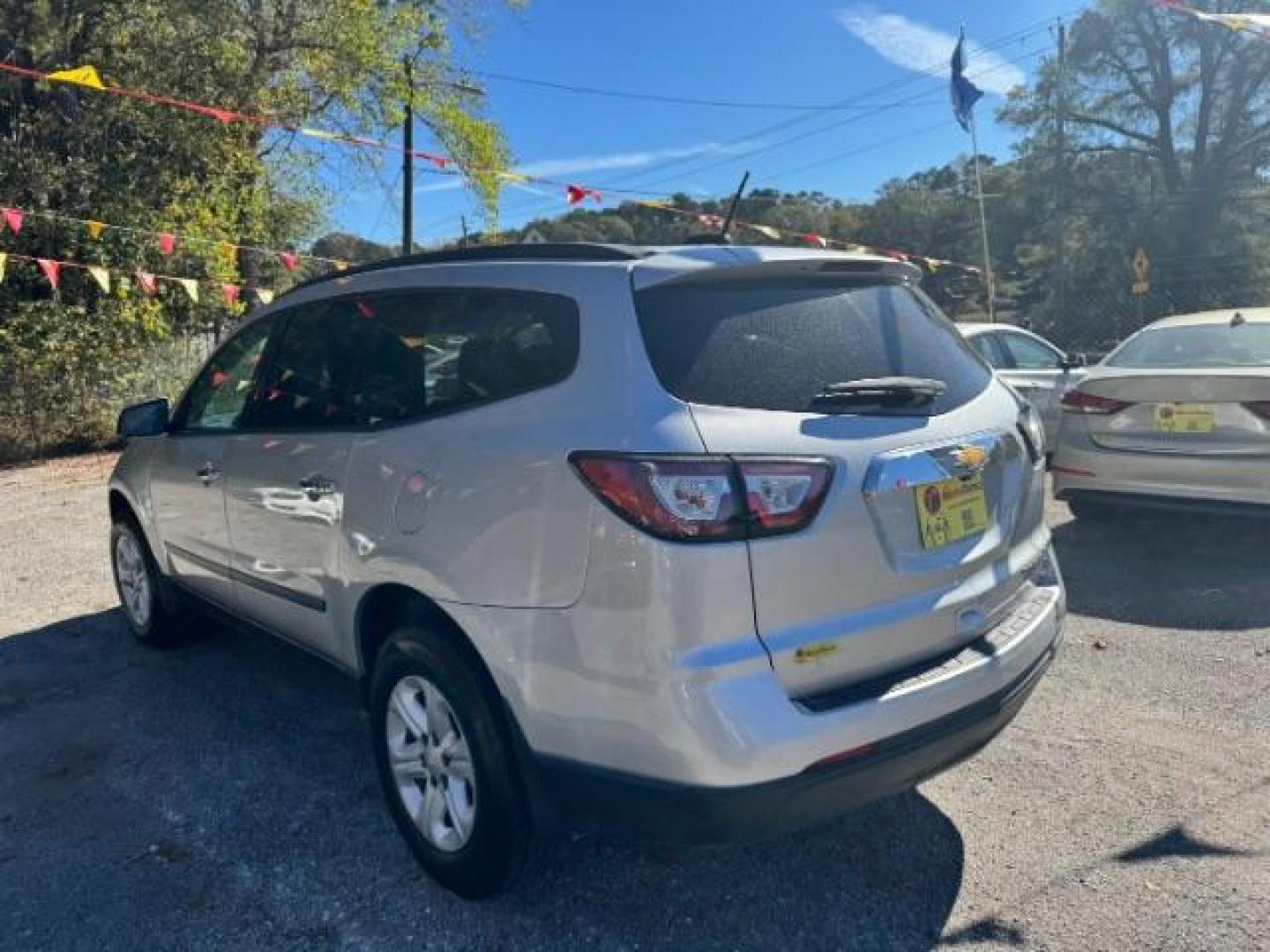 2016 Silver Chevrolet Traverse LS FWD w/PDC (1GNKRFED9GJ) with an 3.6L V6 DOHC 24V engine, 6-Speed Automatic transmission, located at 1806 Veterans Memorial Hwy SW, Austell, GA, 30168, (770) 944-9558, 33.817959, -84.606987 - Photo#4