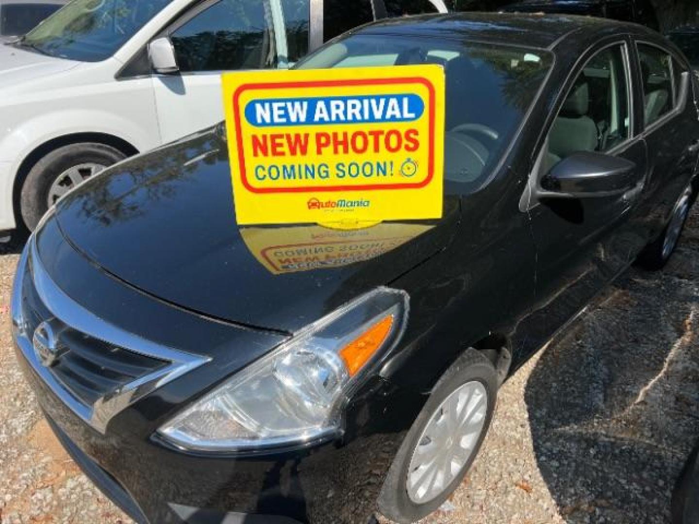 2019 Black Nissan Versa 1.6 S Plus (3N1CN7AP8KL) with an 1.6L L4 DOHC 16V engine, Continuously Variable Transmission transmission, located at 1806 Veterans Memorial Hwy SW, Austell, GA, 30168, (770) 944-9558, 33.817959, -84.606987 - Photo#0