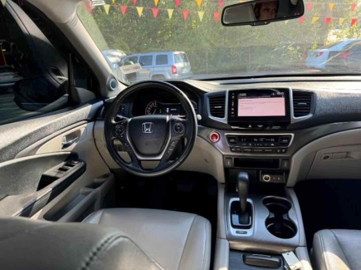 2017 Gray Honda Pilot EXL 2WD (5FNYF5H50HB) with an 3.5L V6 SOHC 24V engine, 6-Speed Automatic transmission, located at 1806 Veterans Memorial Hwy SW, Austell, GA, 30168, (770) 944-9558, 33.817959, -84.606987 - Photo#11