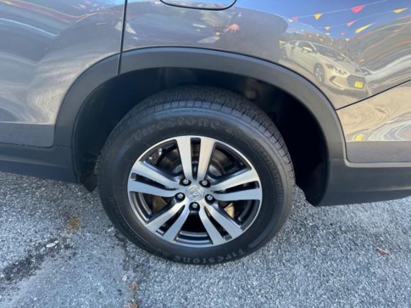 2017 Gray Honda Pilot EXL 2WD (5FNYF5H50HB) with an 3.5L V6 SOHC 24V engine, 6-Speed Automatic transmission, located at 1806 Veterans Memorial Hwy SW, Austell, GA, 30168, (770) 944-9558, 33.817959, -84.606987 - Photo#25