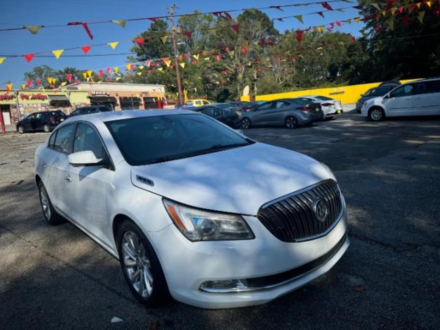 2015 White Buick LaCrosse Leather Package (1G4GB5G37FF) with an 3.6L V6 DOHC 24V FFV engine, 6-Speed Automatic transmission, located at 1806 Veterans Memorial Hwy SW, Austell, GA, 30168, (770) 944-9558, 33.817959, -84.606987 - Photo#2