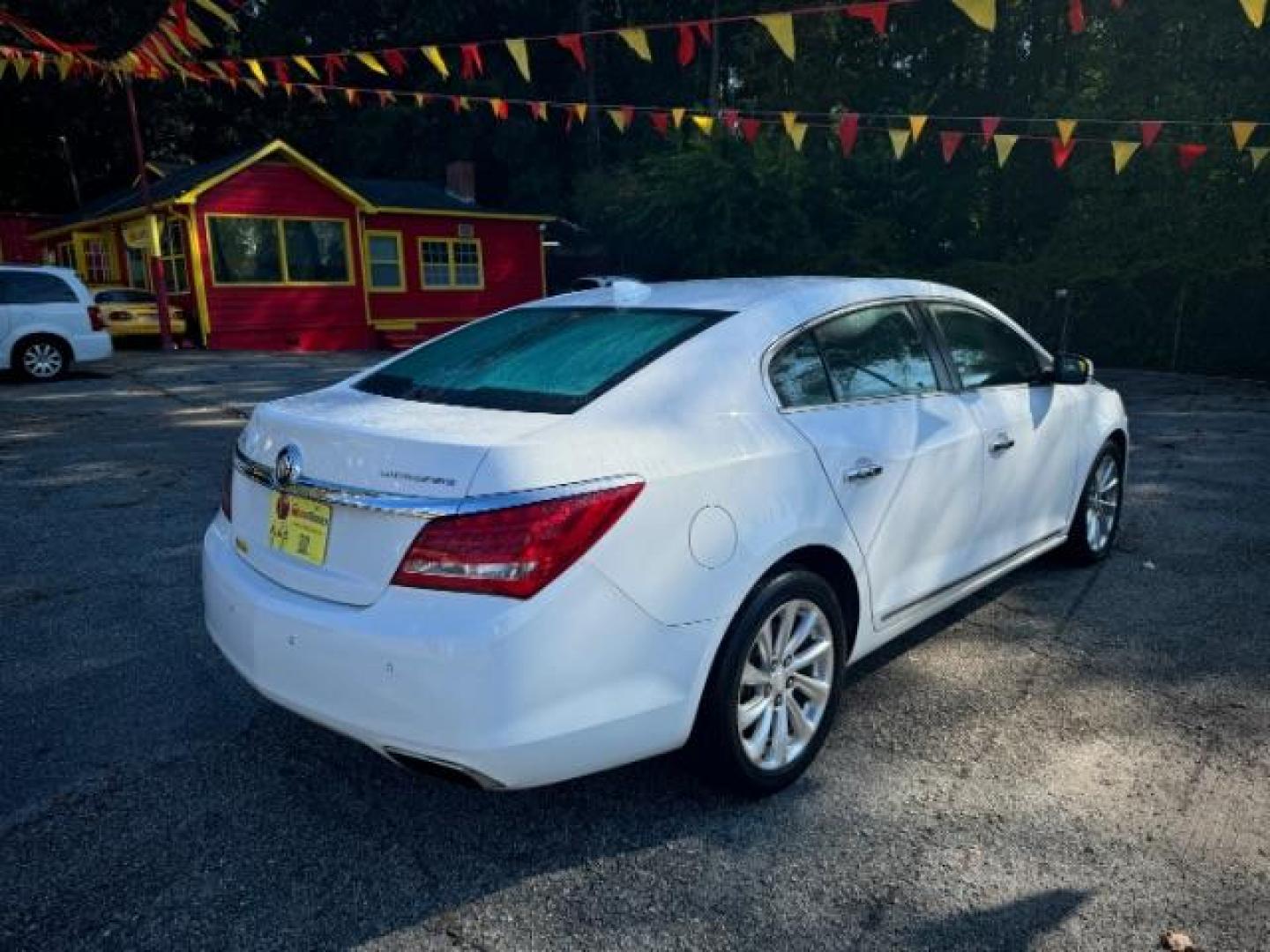 2015 White Buick LaCrosse Leather Package (1G4GB5G37FF) with an 3.6L V6 DOHC 24V FFV engine, 6-Speed Automatic transmission, located at 1806 Veterans Memorial Hwy SW, Austell, GA, 30168, (770) 944-9558, 33.817959, -84.606987 - Photo#3