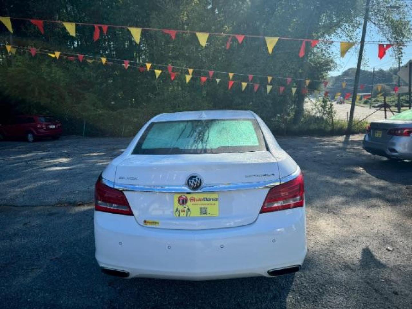 2015 White Buick LaCrosse Leather Package (1G4GB5G37FF) with an 3.6L V6 DOHC 24V FFV engine, 6-Speed Automatic transmission, located at 1806 Veterans Memorial Hwy SW, Austell, GA, 30168, (770) 944-9558, 33.817959, -84.606987 - Photo#4