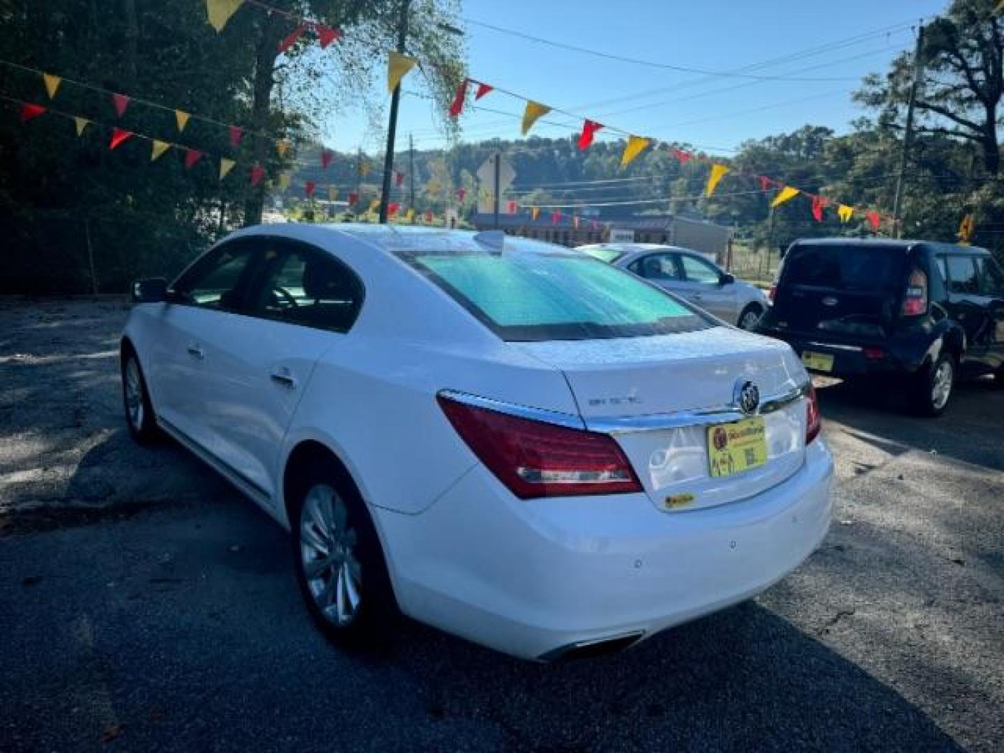 2015 White Buick LaCrosse Leather Package (1G4GB5G37FF) with an 3.6L V6 DOHC 24V FFV engine, 6-Speed Automatic transmission, located at 1806 Veterans Memorial Hwy SW, Austell, GA, 30168, (770) 944-9558, 33.817959, -84.606987 - Photo#5