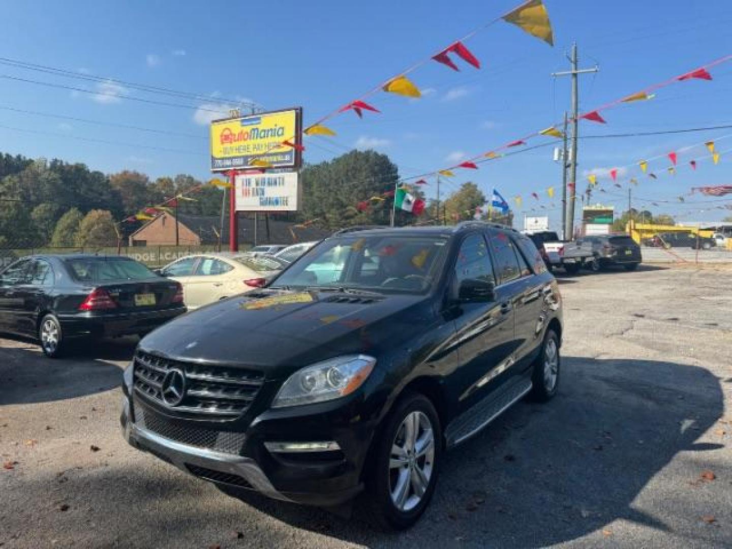 2014 Black Mercedes-Benz M-Class ML350 4MATIC (4JGDA5JB5EA) with an 3.5L V6 DOHC 24V engine, 7-Speed Automatic transmission, located at 1806 Veterans Memorial Hwy SW, Austell, GA, 30168, (770) 944-9558, 33.817959, -84.606987 - Photo#0