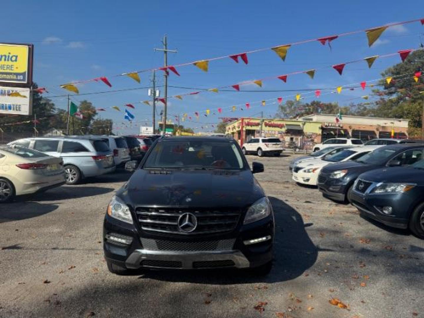 2014 Black Mercedes-Benz M-Class ML350 4MATIC (4JGDA5JB5EA) with an 3.5L V6 DOHC 24V engine, 7-Speed Automatic transmission, located at 1806 Veterans Memorial Hwy SW, Austell, GA, 30168, (770) 944-9558, 33.817959, -84.606987 - Photo#1