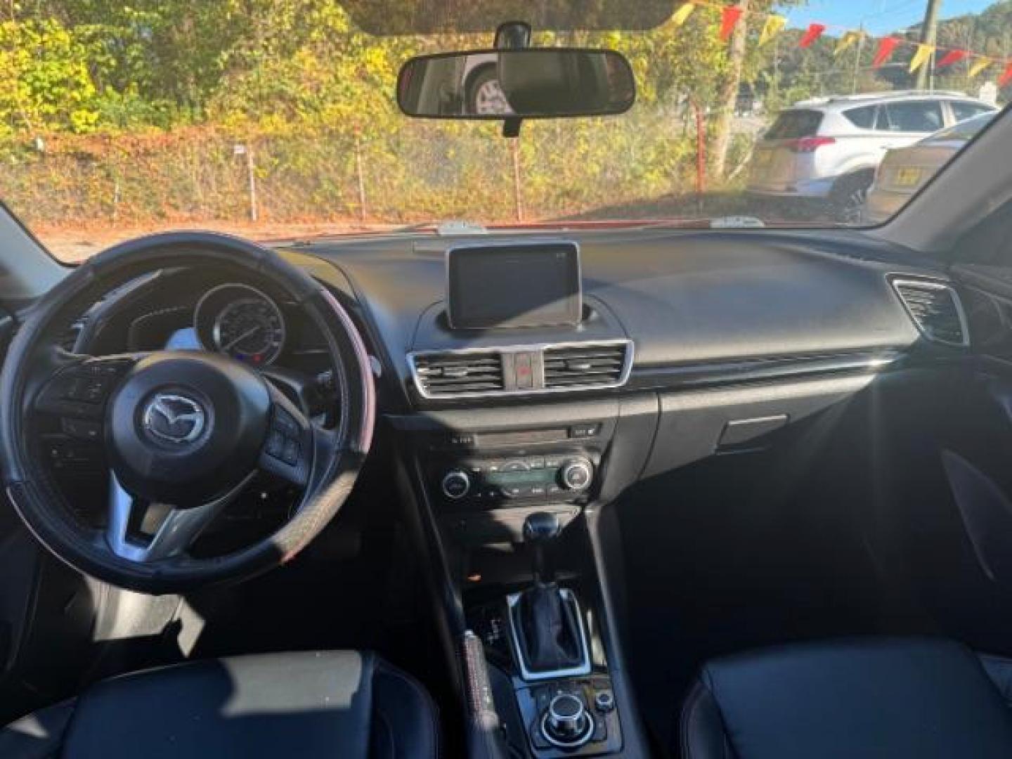 2015 Red Mazda MAZDA3 i Grand Touring AT 4-Door (3MZBM1W76FM) with an 2.0L L4 DOHC 16V engine, 6-Speed Automatic transmission, located at 1806 Veterans Memorial Hwy SW, Austell, GA, 30168, (770) 944-9558, 33.817959, -84.606987 - Photo#10