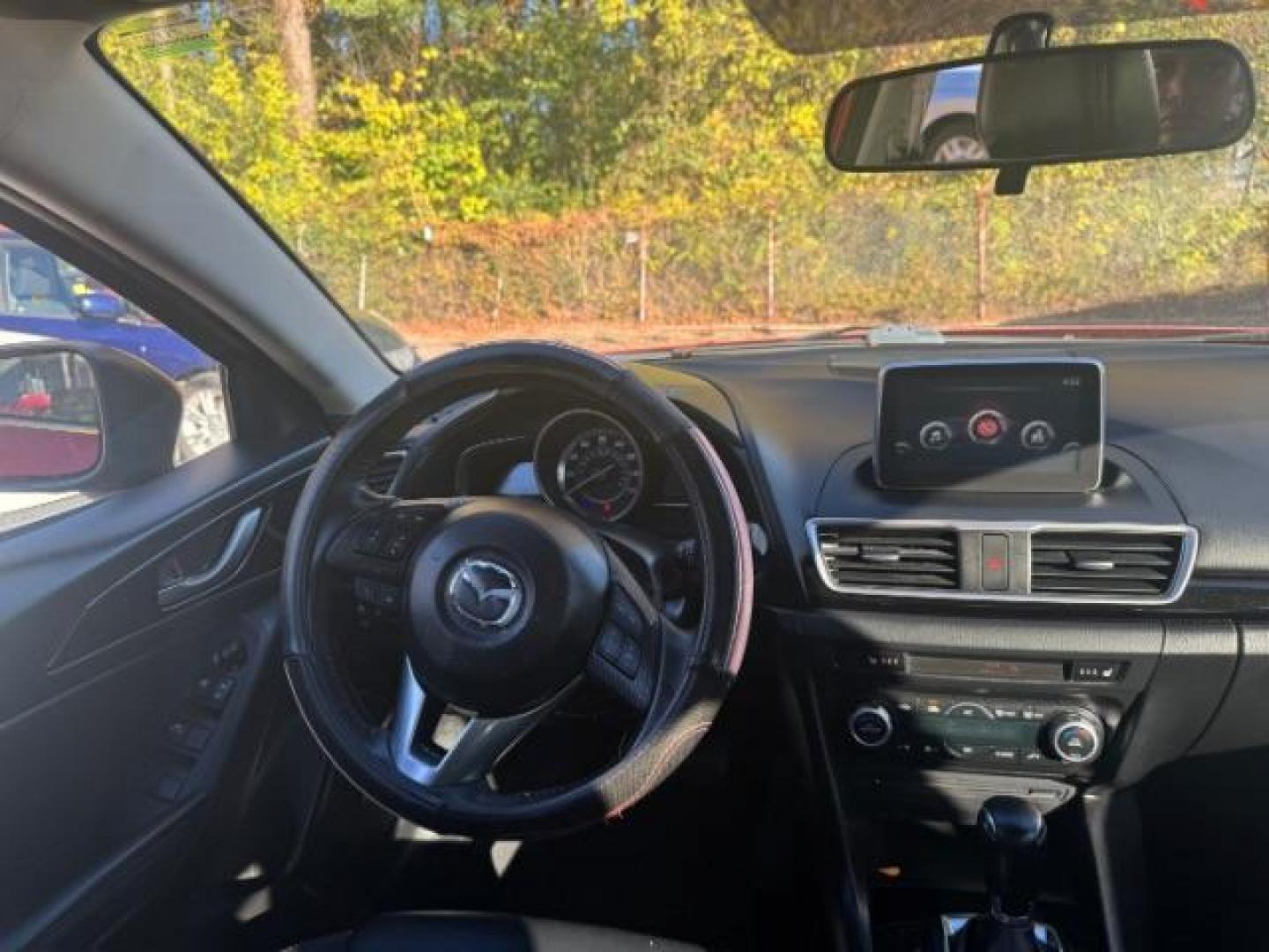 2015 Red Mazda MAZDA3 i Grand Touring AT 4-Door (3MZBM1W76FM) with an 2.0L L4 DOHC 16V engine, 6-Speed Automatic transmission, located at 1806 Veterans Memorial Hwy SW, Austell, GA, 30168, (770) 944-9558, 33.817959, -84.606987 - Photo#11