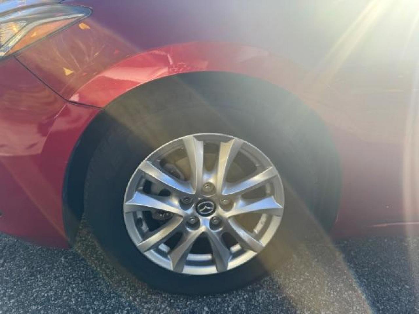 2015 Red Mazda MAZDA3 i Grand Touring AT 4-Door (3MZBM1W76FM) with an 2.0L L4 DOHC 16V engine, 6-Speed Automatic transmission, located at 1806 Veterans Memorial Hwy SW, Austell, GA, 30168, (770) 944-9558, 33.817959, -84.606987 - Photo#15