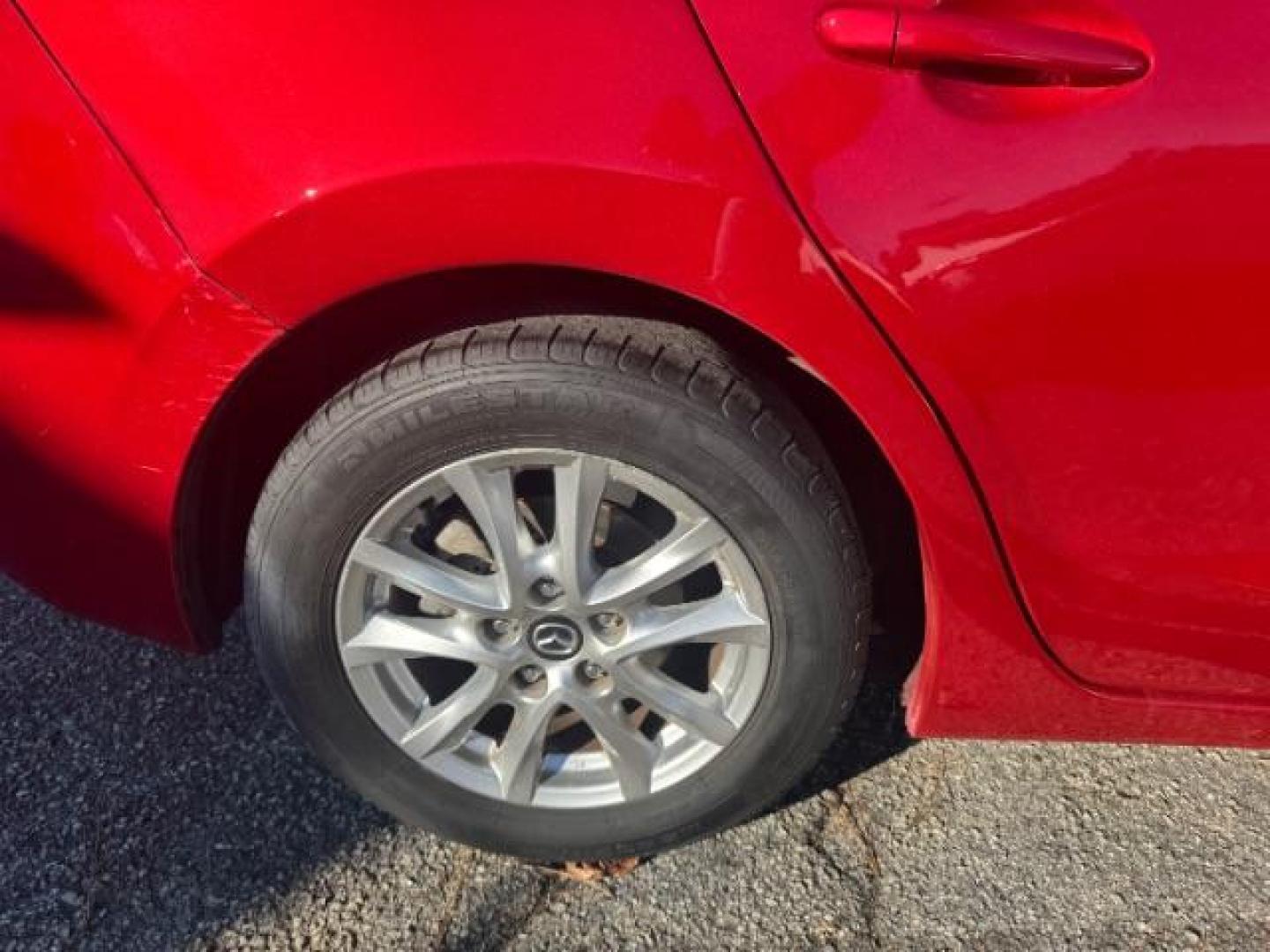 2015 Red Mazda MAZDA3 i Grand Touring AT 4-Door (3MZBM1W76FM) with an 2.0L L4 DOHC 16V engine, 6-Speed Automatic transmission, located at 1806 Veterans Memorial Hwy SW, Austell, GA, 30168, (770) 944-9558, 33.817959, -84.606987 - Photo#17