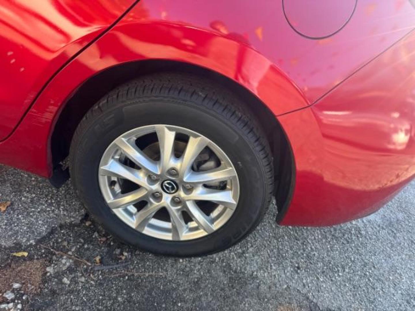 2015 Red Mazda MAZDA3 i Grand Touring AT 4-Door (3MZBM1W76FM) with an 2.0L L4 DOHC 16V engine, 6-Speed Automatic transmission, located at 1806 Veterans Memorial Hwy SW, Austell, GA, 30168, (770) 944-9558, 33.817959, -84.606987 - Photo#19