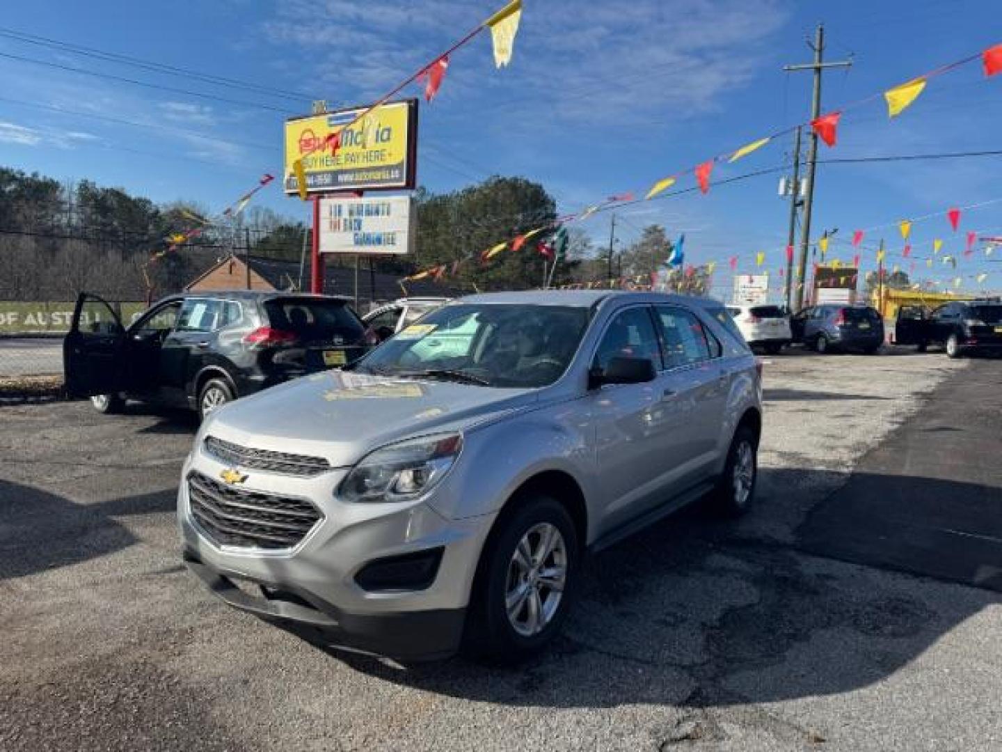 2017 Silver Chevrolet Equinox LS 2WD (2GNALBEK7H1) with an 2.4L L4 DOHC 16V FFV engine, 6-Speed Automatic transmission, located at 1806 Veterans Memorial Hwy SW, Austell, GA, 30168, (770) 944-9558, 33.817959, -84.606987 - Photo#0