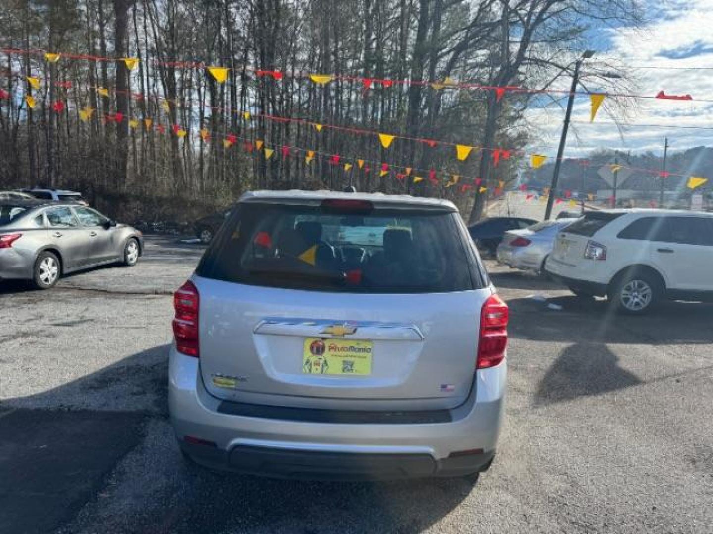 2017 Silver Chevrolet Equinox LS 2WD (2GNALBEK7H1) with an 2.4L L4 DOHC 16V FFV engine, 6-Speed Automatic transmission, located at 1806 Veterans Memorial Hwy SW, Austell, GA, 30168, (770) 944-9558, 33.817959, -84.606987 - Photo#3