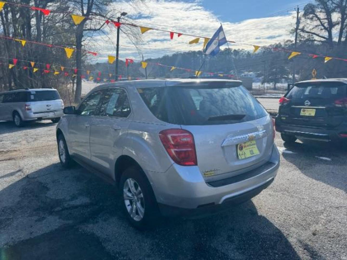 2017 Silver Chevrolet Equinox LS 2WD (2GNALBEK7H1) with an 2.4L L4 DOHC 16V FFV engine, 6-Speed Automatic transmission, located at 1806 Veterans Memorial Hwy SW, Austell, GA, 30168, (770) 944-9558, 33.817959, -84.606987 - Photo#5