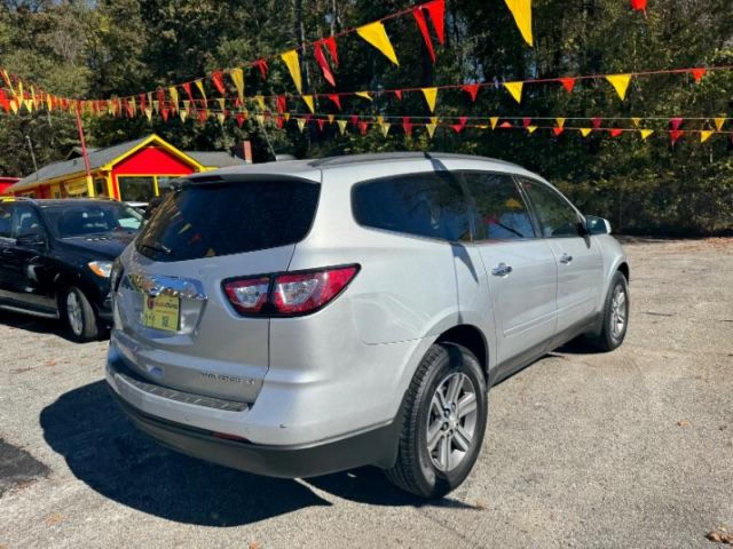 2016 Silver Chevrolet Traverse 2LT AWD (1GNKVHKD5GJ) with an 3.6L V6 DOHC 24V engine, 6-Speed Automatic transmission, located at 1806 Veterans Memorial Hwy SW, Austell, GA, 30168, (770) 944-9558, 33.817959, -84.606987 - Photo#3