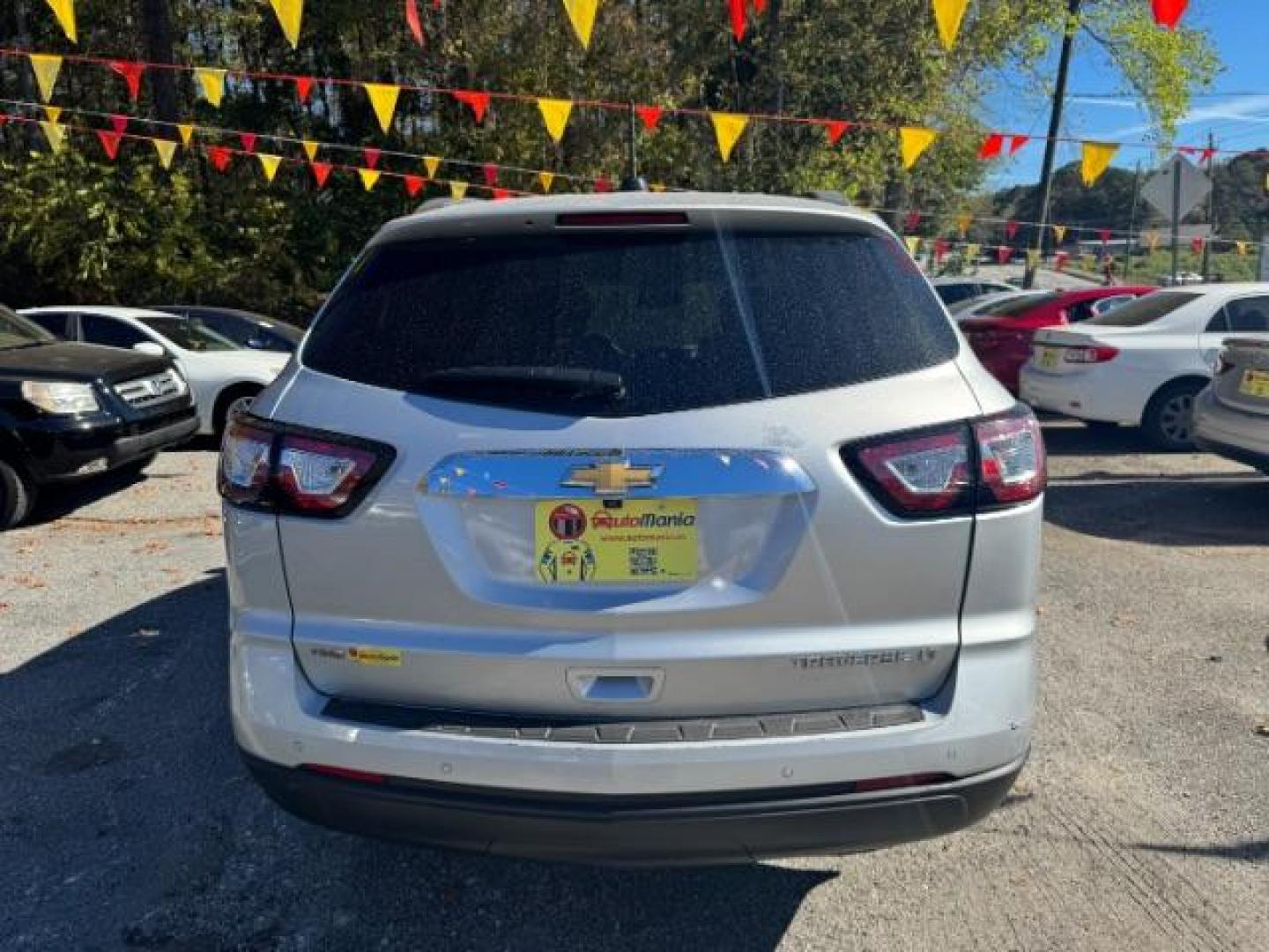 2016 Silver Chevrolet Traverse 2LT AWD (1GNKVHKD5GJ) with an 3.6L V6 DOHC 24V engine, 6-Speed Automatic transmission, located at 1806 Veterans Memorial Hwy SW, Austell, GA, 30168, (770) 944-9558, 33.817959, -84.606987 - Photo#4