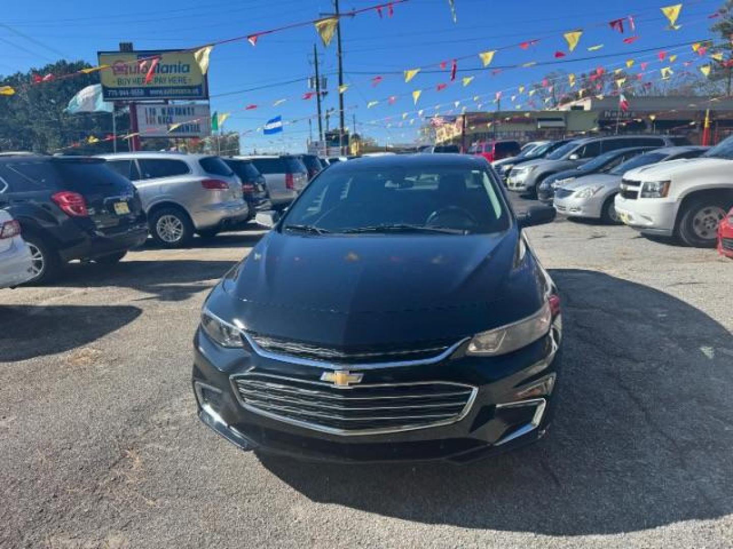 2017 Black Chevrolet Malibu LS (1G1ZB5ST0HF) with an 1.5L L4 DOHC 16V engine, 6-Speed Automatic transmission, located at 1806 Veterans Memorial Hwy SW, Austell, GA, 30168, (770) 944-9558, 33.817959, -84.606987 - Photo#1