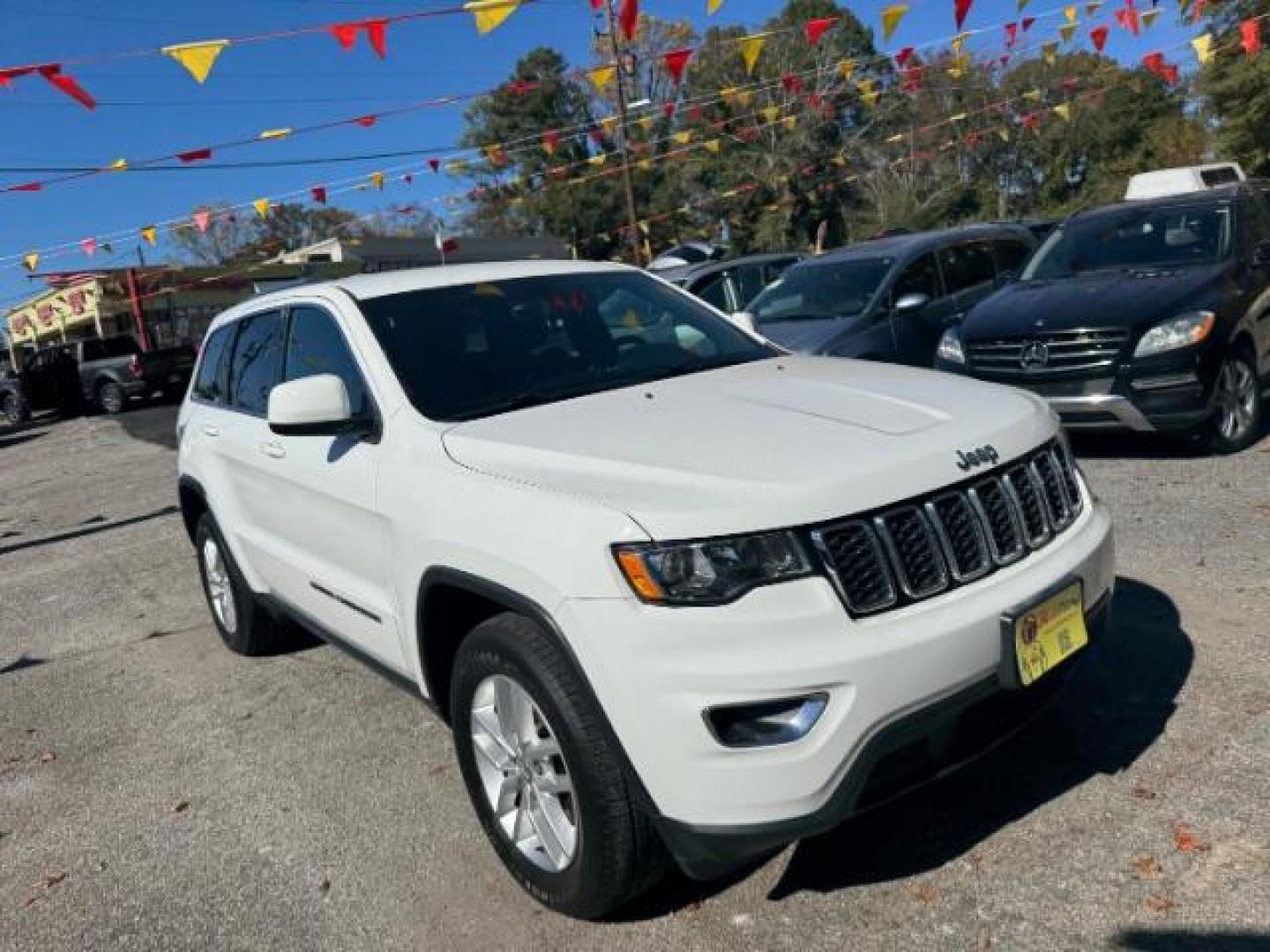 2017 White Jeep Grand Cherokee Laredo 4WD (1C4RJFAG0HC) with an 3.6L V6 DOHC 24V engine, 8-Speed Automatic transmission, located at 1806 Veterans Memorial Hwy SW, Austell, GA, 30168, (770) 944-9558, 33.817959, -84.606987 - Photo#2